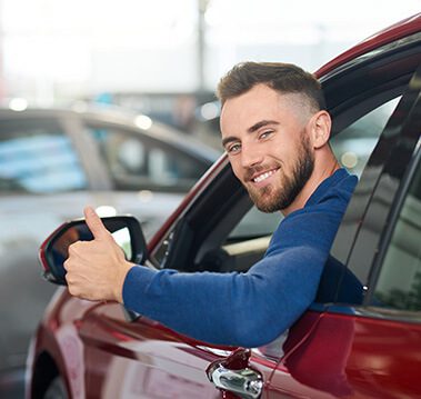 WD - Young bearded customer feeling happy